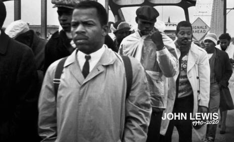 John Lewis marches across the Edmund Pettis Bridge in Selma, Alabama, March 7, 1965.