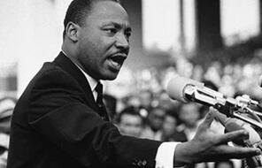 B&W photo of Martin Luther King Junior giving a speech