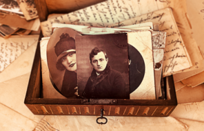 Antique headshots in wooden box.
