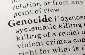 Definition of genocide stock photo.