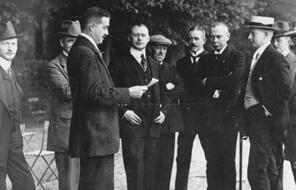 German delegates talk in May 1919 during the signing of the Treaty of Versailles in France.
