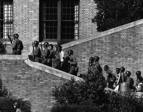  101st Airborne Division escort the Little Rock Nine students into Central High School in Little Rock, Arkansas.